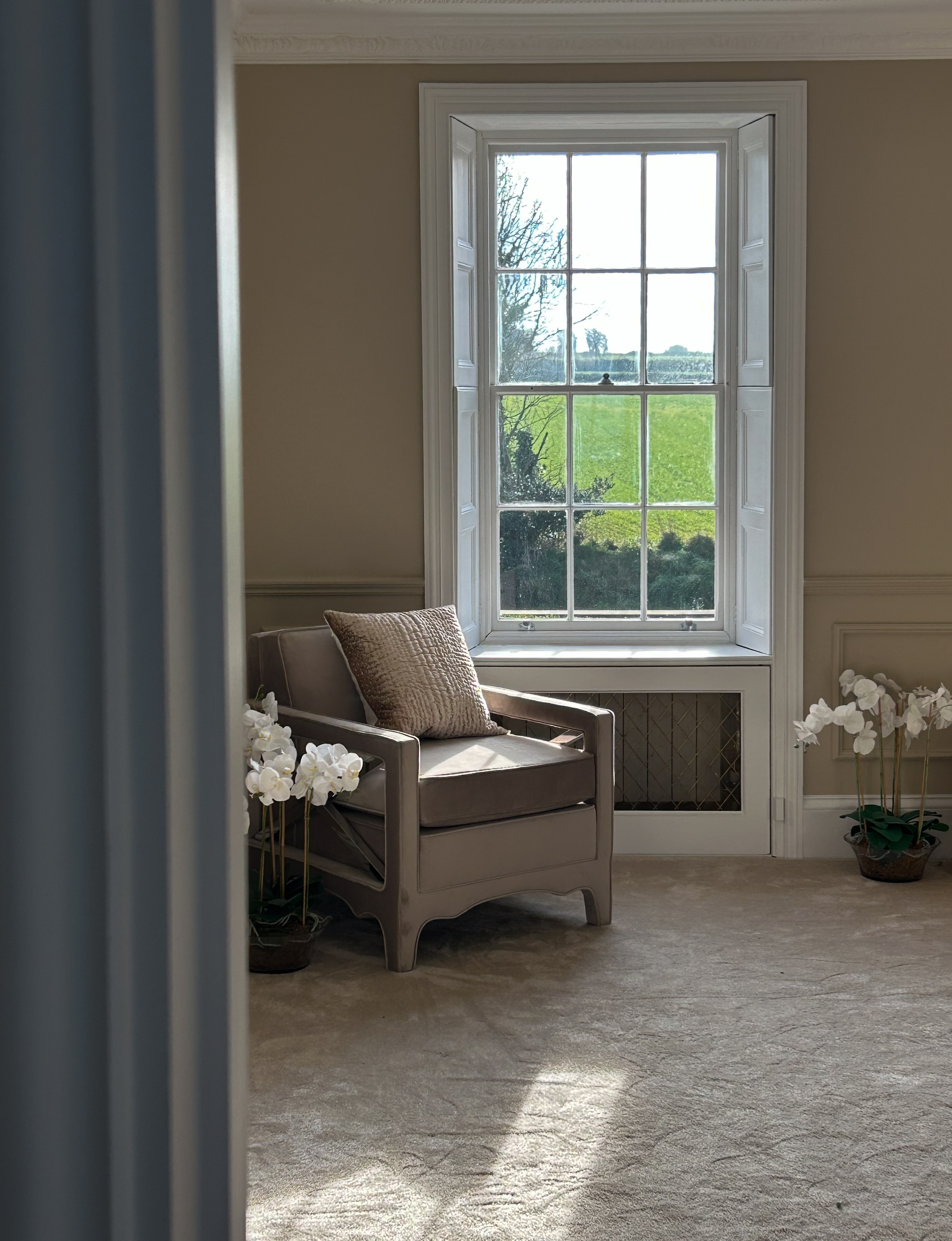Window seat area with detailed panelling work